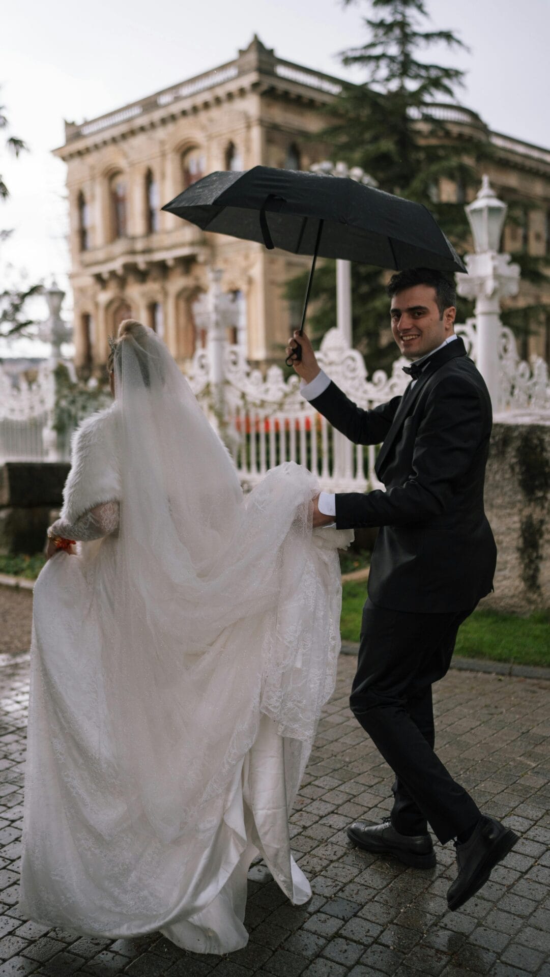 Sharing an umbrella in the rain